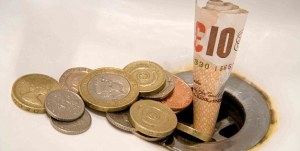 English money going down the drain